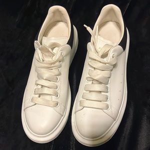 Worn a few time. Still look good. Alexander McQueens. Just don't want anymore.